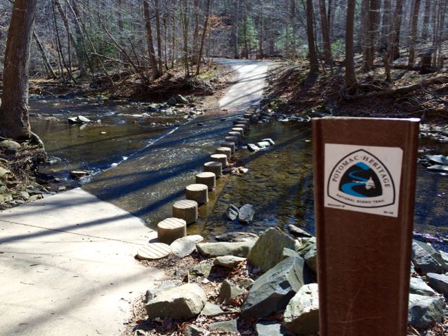 Potomac Heritage Trail marker and stream crossing Scotts Run loop hike