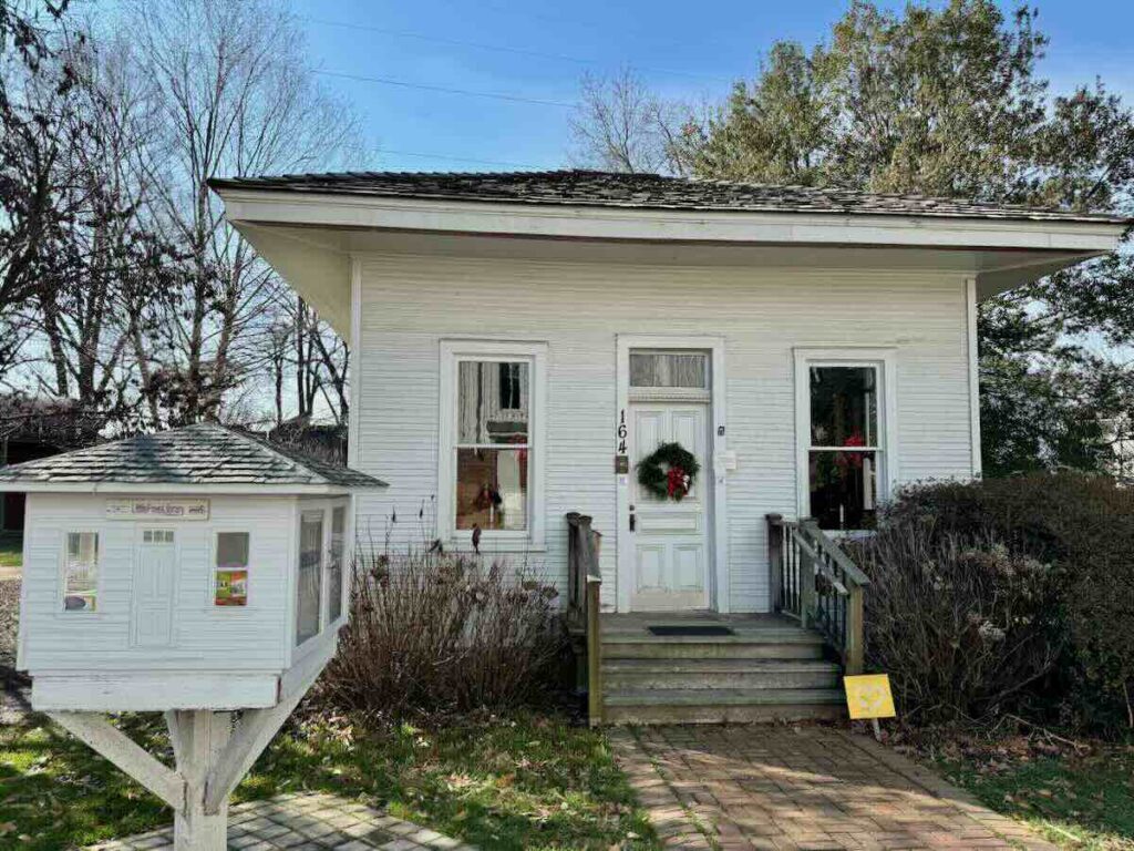The historic 1897 Original Library Museum of Vienna Virginia and it's matching Little Free Library.