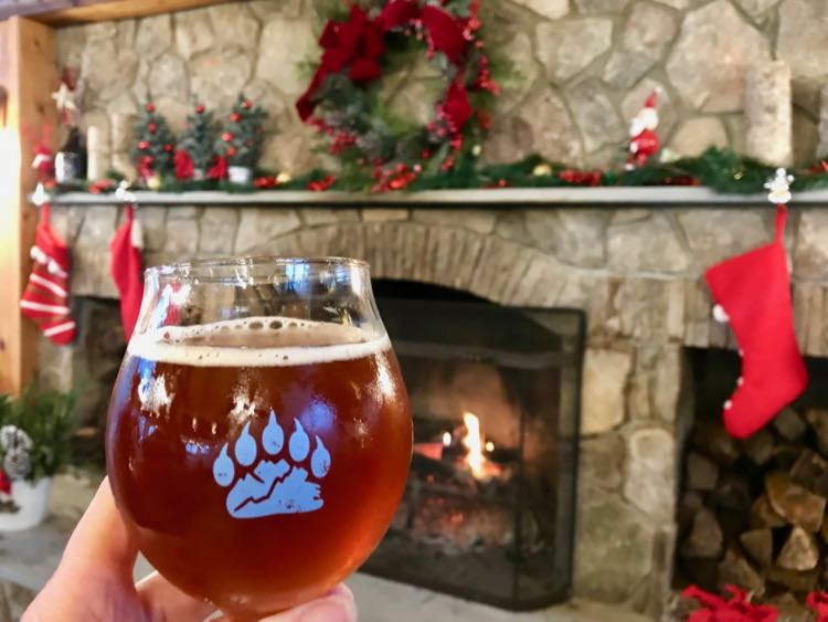 Bear Chase Brewing holiday toast by the fireplace in Bluemont VA