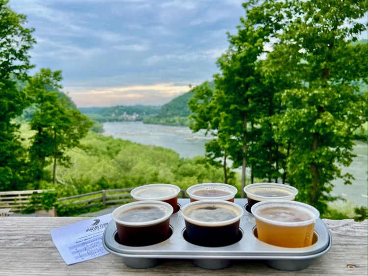 Flight of beer with a view of Harpers Ferry WV at Harpers Ferry Brewing Purcellville Virginia