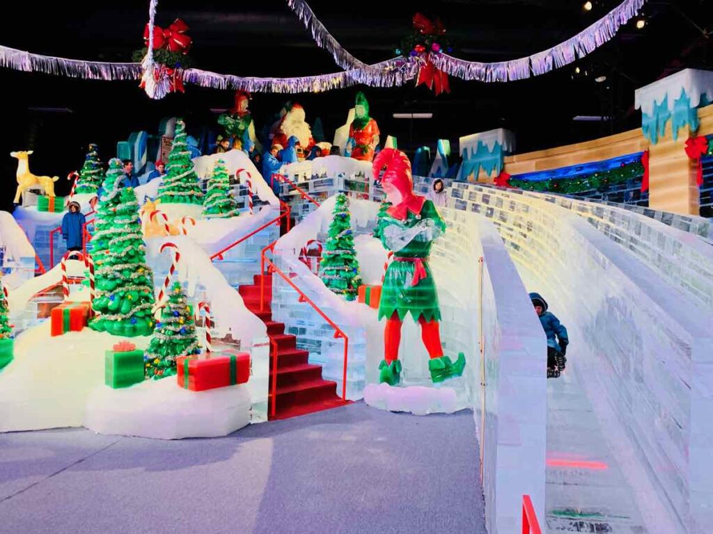 Kida and adults can try the Ice slides at ICE! 2022 A Christmas Story