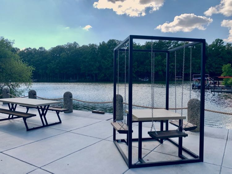 South Lakes Plaza picnic tables offer pretty views of Lake Thoreau in Reston Virginia