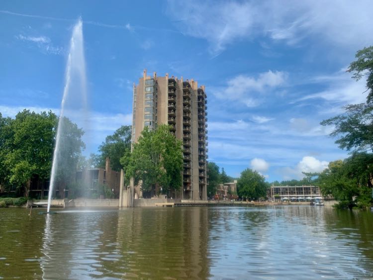 A view of Lake Anne Fountain and Heron House from from a kayak, Reston Virginia